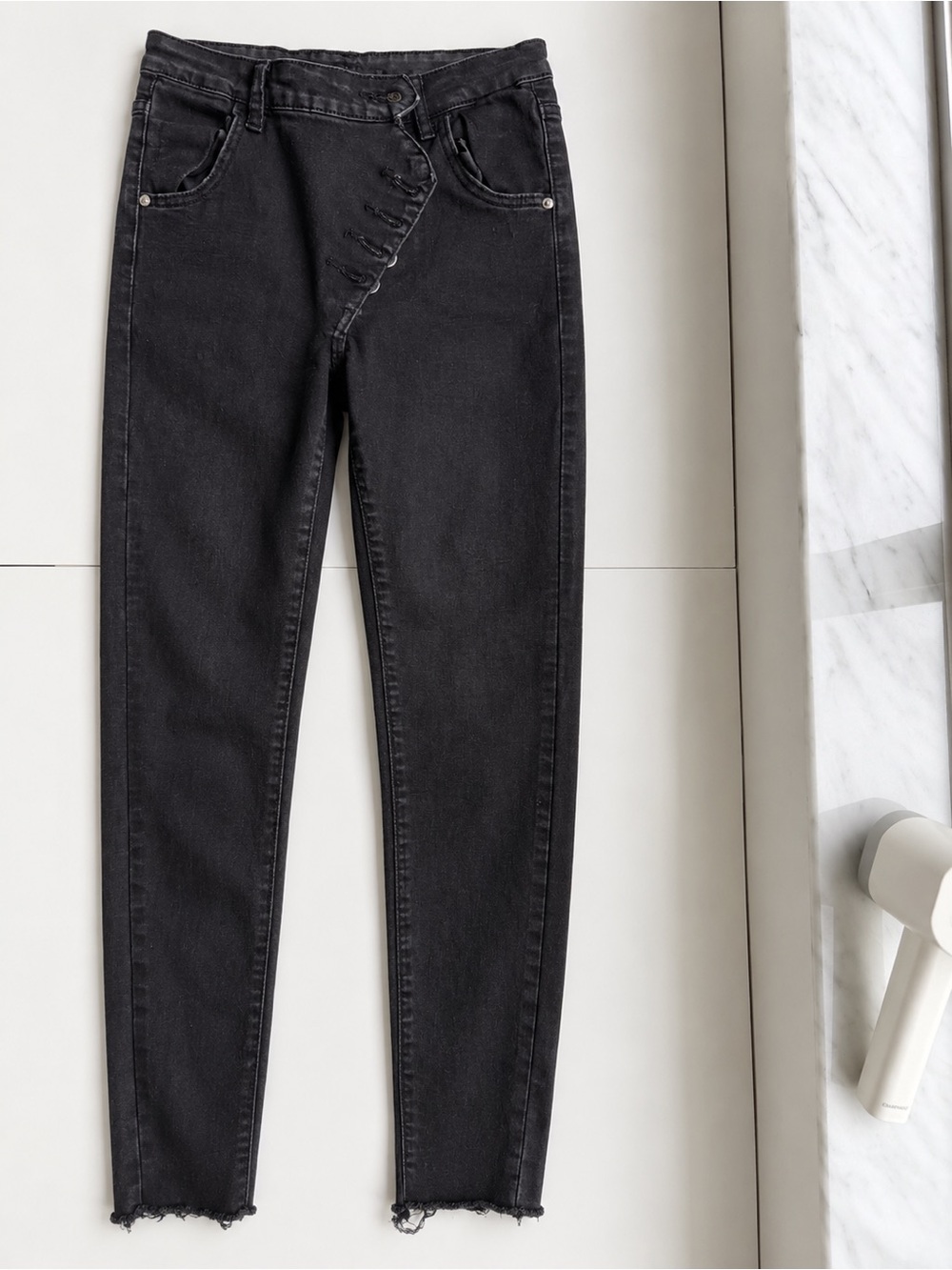 Women’s Black Skinny Jeans Asymmetrical Button Front Raw Hem